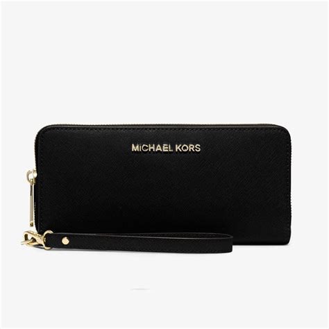 michael michael kors jet set travel logo continental wristlet|Amazon.com: Michael Kors Logo Continental Wristlet.